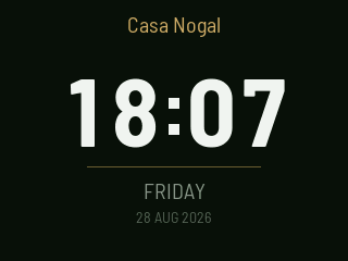 Classic face: 18:07 in large type under the store name Casa Nogal, with FRIDAY 28 AUG 2026 underneath.